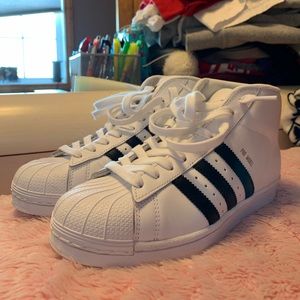 White high top adidas sneakers